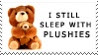 A stamp that says I still sleep with plushies, along with a picture of a teddy bear